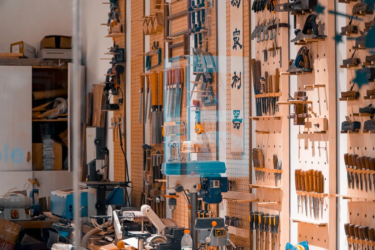 Organized home workshop with power tools on a workbench