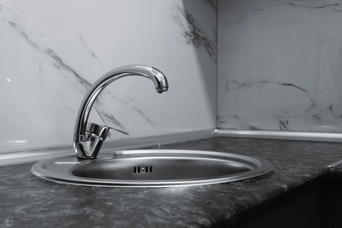 DIY project: removing an old kitchen faucet and installing a new one